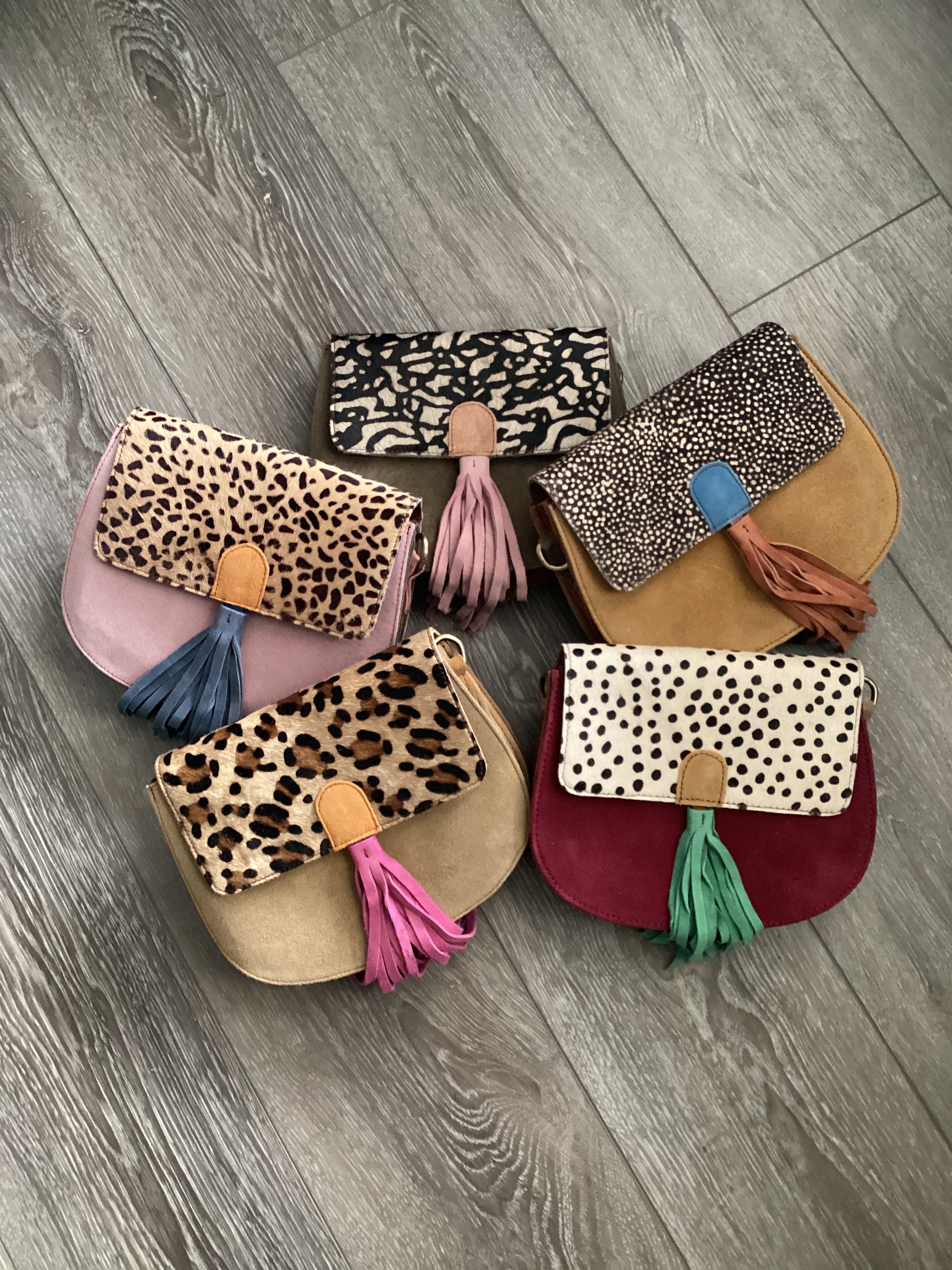 Bright Colored Cowhide Tasseled Saddle Purse