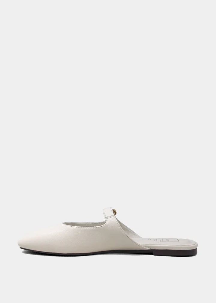 White slipper on a light gray background