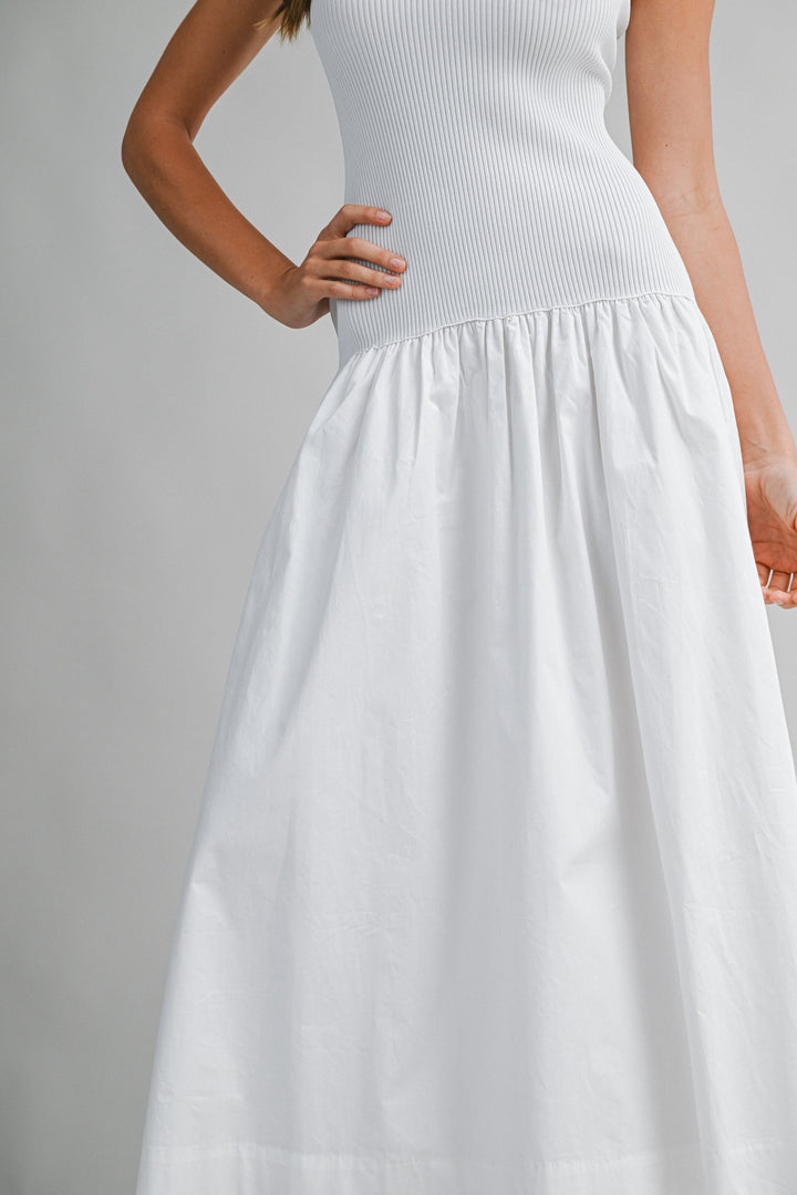 White dress with a plain background