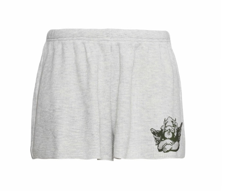Gray shorts with a small graphic on a white background