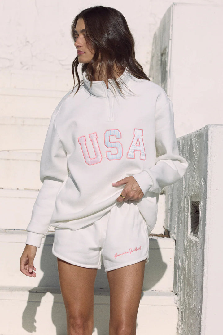 Woman wearing a white &