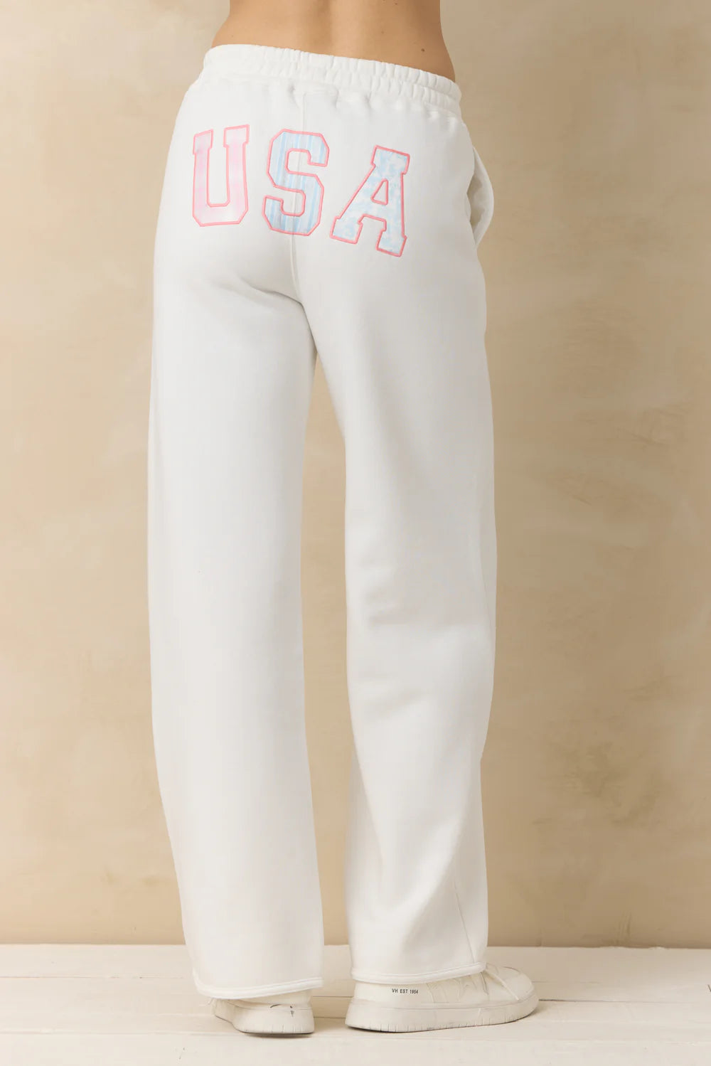 White sweatpants with &
