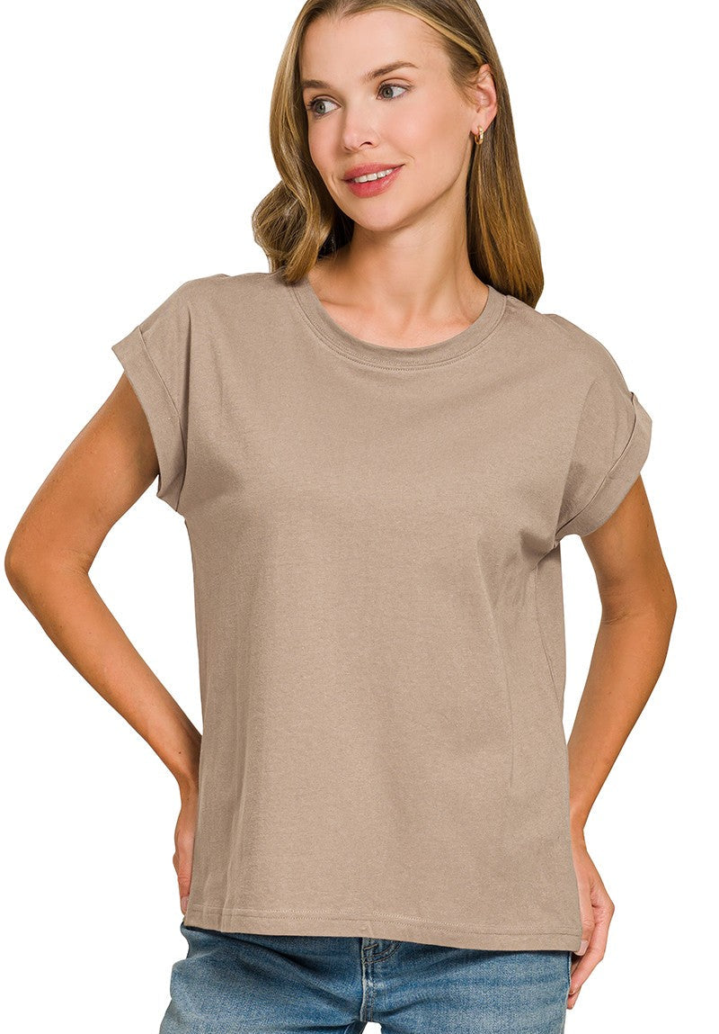 Woman wearing a beige t-shirt on a white background