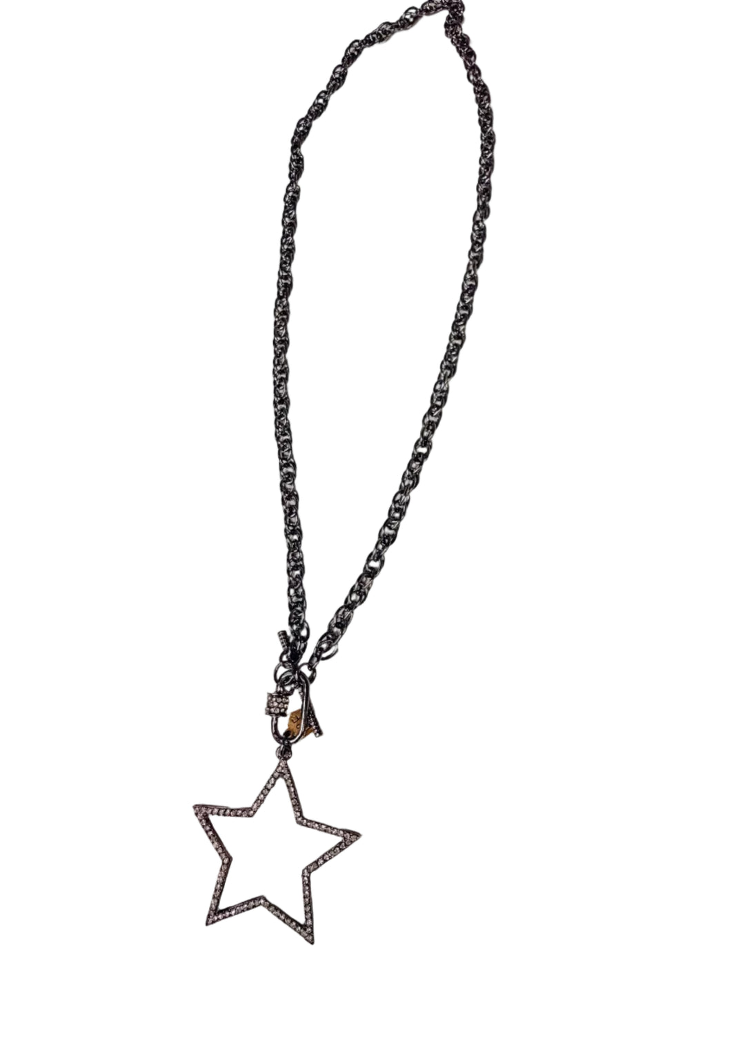Silver chain necklace with large star pendant with pave crystals on white background