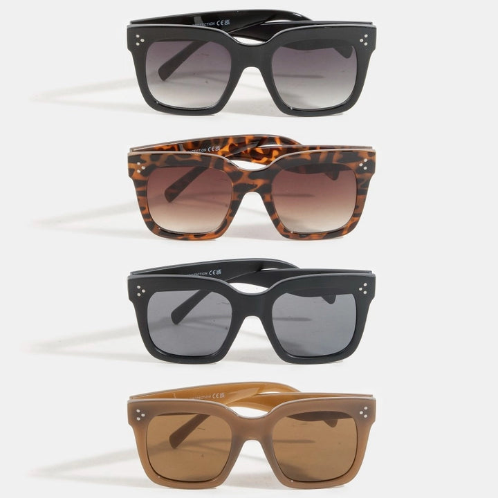 Four pairs of sunglasses with different designs and colors on a white background