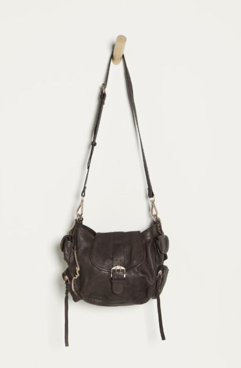 Black leather handbag with a strap on a white background