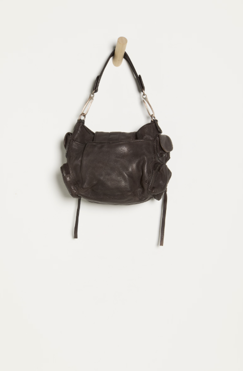 Brown leather handbag with shoulder straps on a white background