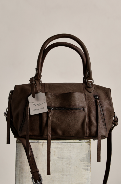 Brown leather purse with white background