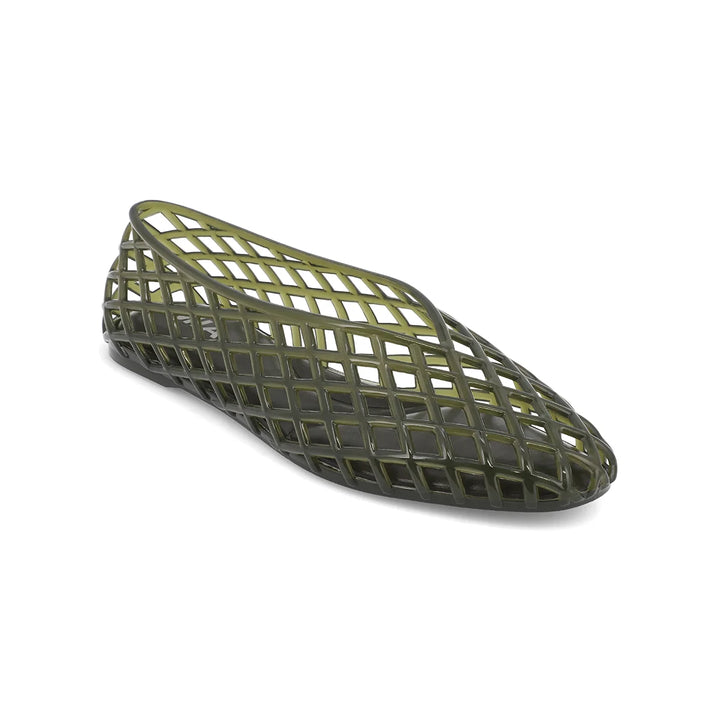 Green woven jelly shoe on white background