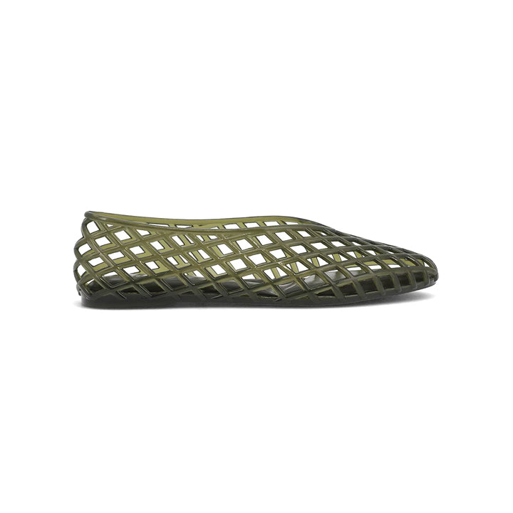 Green woven jelly shoe on white background