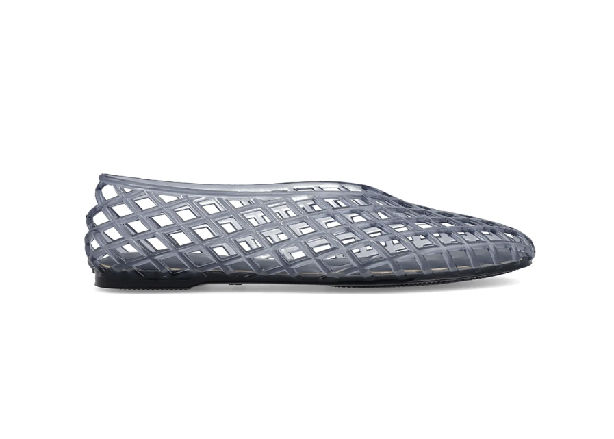 A single grey jelly slipper with a grid pattern and pointed toe, shown in profile against a plain white background.