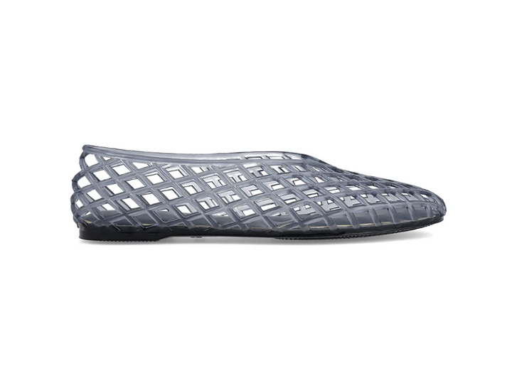 A single grey jelly slipper with a grid pattern and pointed toe, shown in profile against a plain white background.