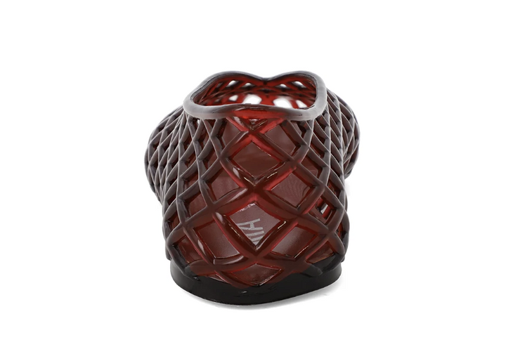 A single red jelly shoe with a crisscross lattice pattern and a black sole, shown from the back on a white background.
