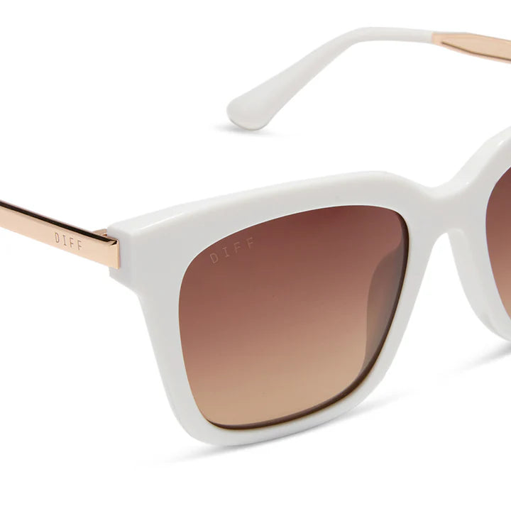 White sunglasses with brown gradient lenses on a white background