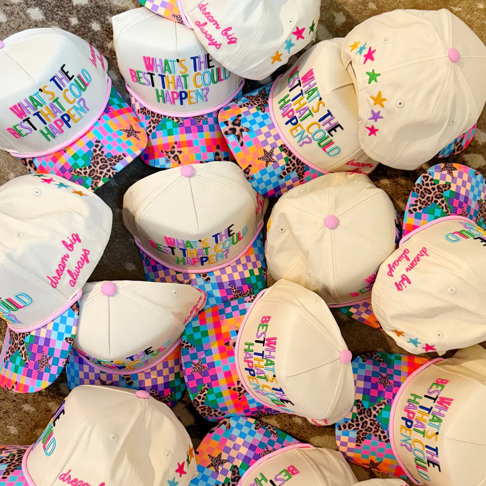 Colorful hats with text on a checkered surface