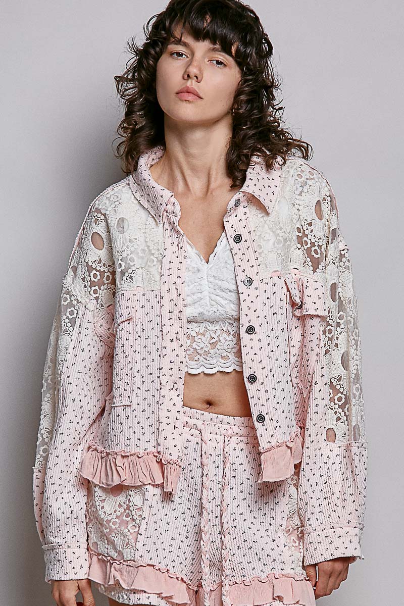 Woman wearing a floral outfit with a light background