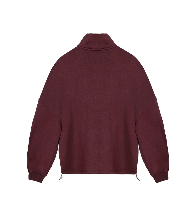 A dark burgundy long-sleeve knit top with a mock neck and drawstring hem, shown from the back on a plain white background.