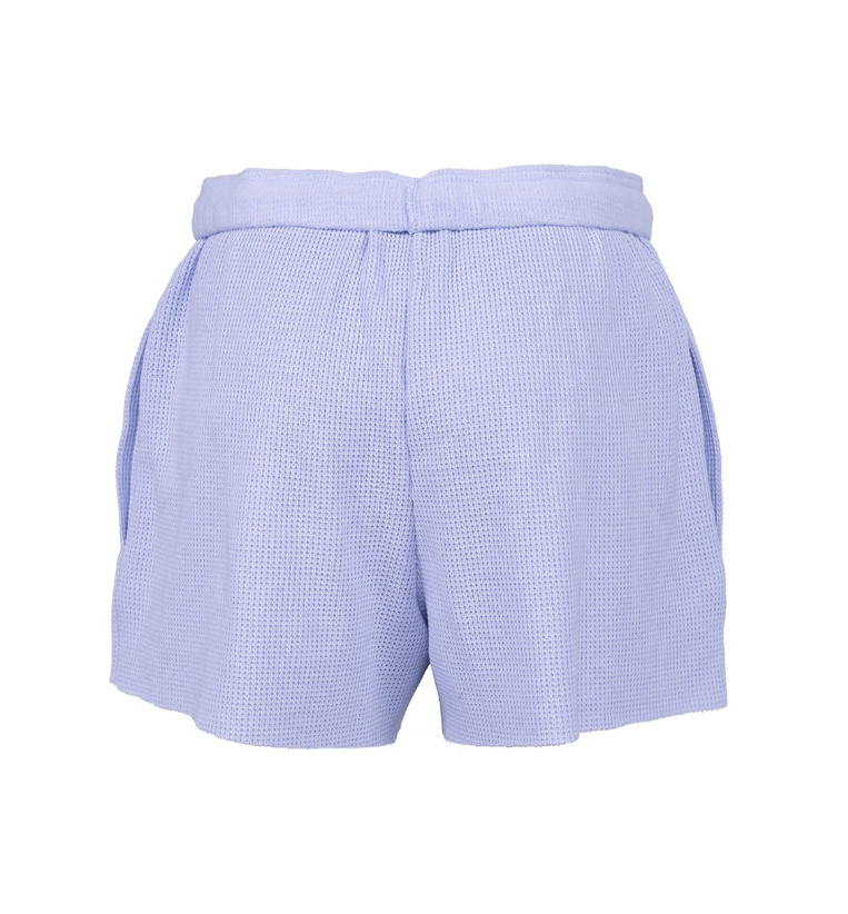 Light blue and white micro-check patterned shorts with a pleated waistband, shown from the back on a white background.