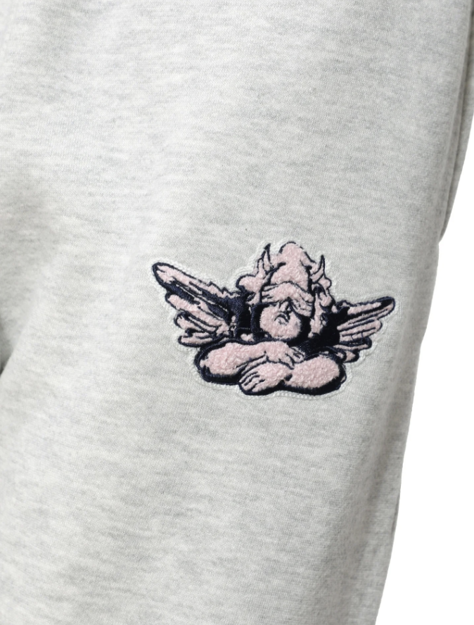 grey sweatpants with angel applique on white background