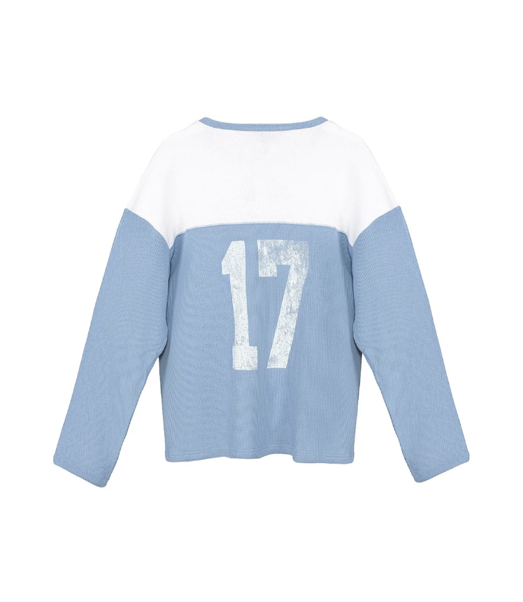 Blue and white thermal long sleeve with number 17 on the back on white background