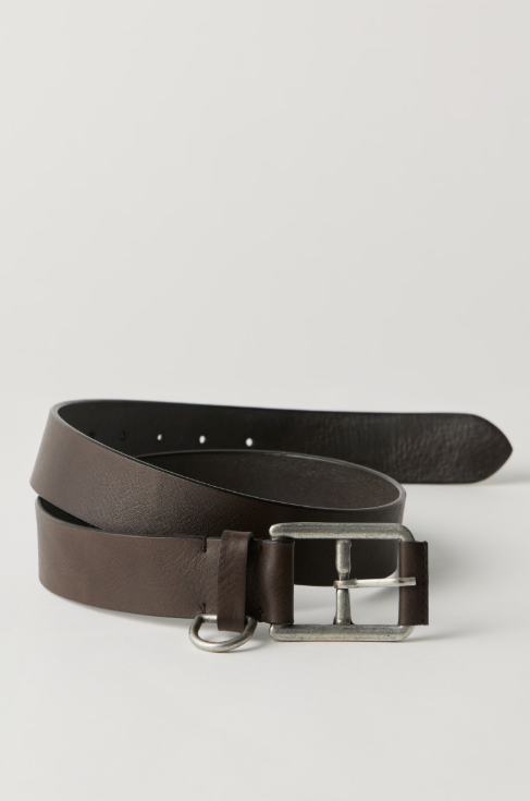 A dark brown leather belt with a silver-toned metal buckle, shown coiled on a light gray studio background.