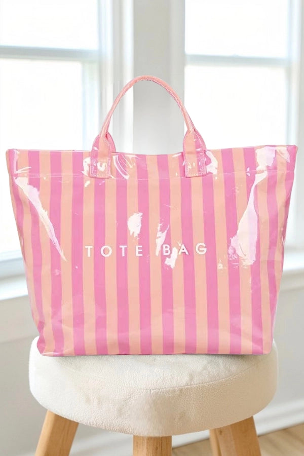 Pink and Orange stripe tote bag sitting on stool 
