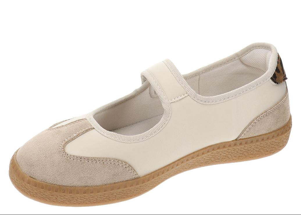 Single sneaker with velcro closure on white background