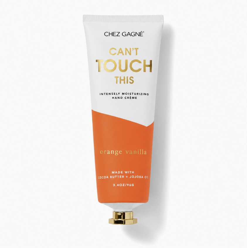 A tube of Chez Gagnée hand cream in the Orange Vanilla scent, featuring a white and orange design with gold lettering, set against a clean white background with a soft shadow.