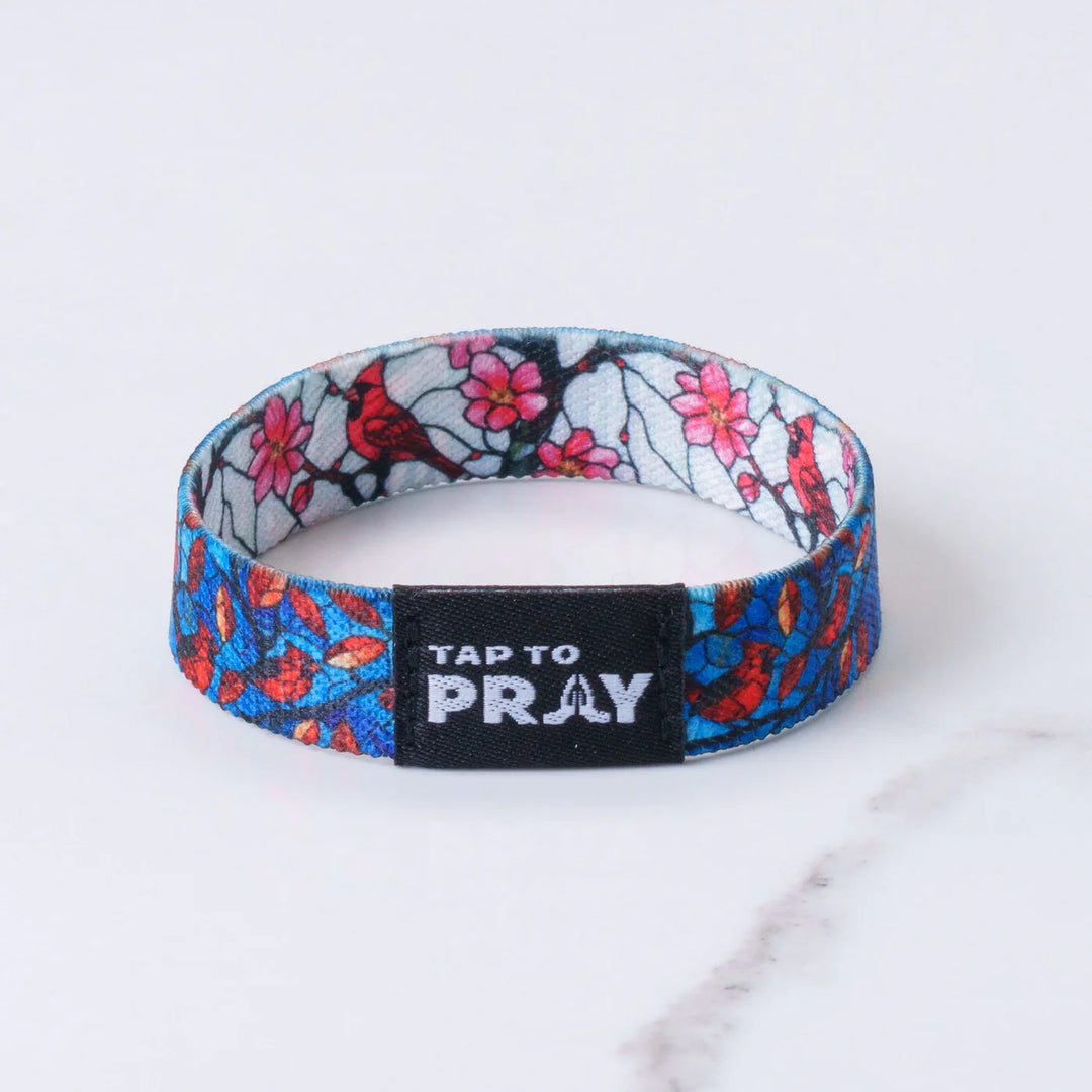 Wristband with floral design and &