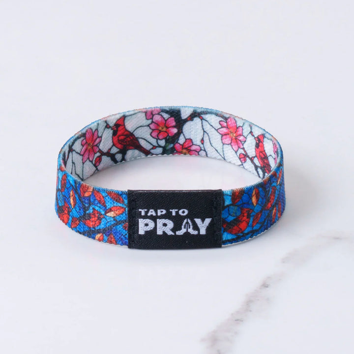 Wristband with floral design and &