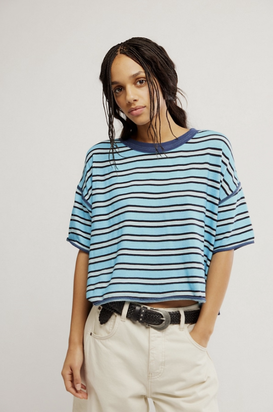 Woman wearing blue stripe shirt on white background