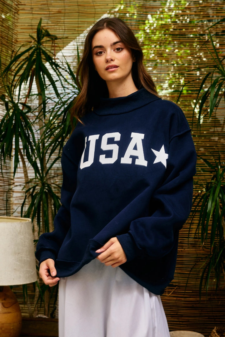 Woman wearing a navy blue &