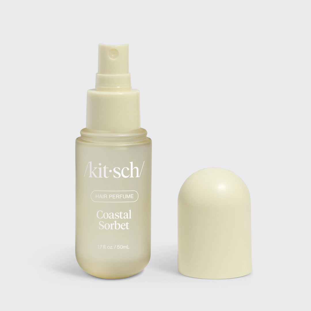 Kitsch hair perfume with the scent coastal sorbet on plain background