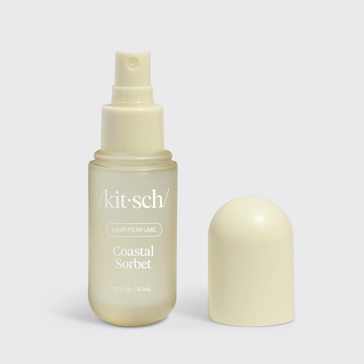 Kitsch hair perfume with the scent coastal sorbet on plain background
