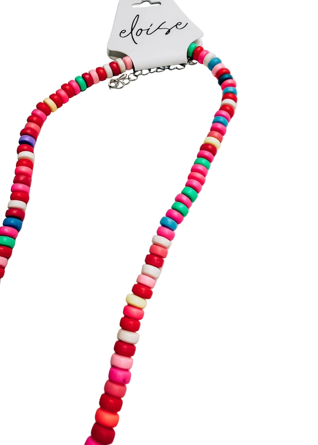 A colorful beaded necklace with alternating round beads in shades of pink, red, orange, green, blue, and white, displayed on a white background with a branded paper tag attached.