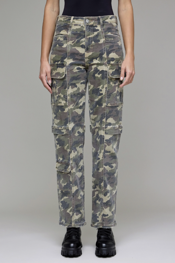 Camouflage cargo pants worn by a person on a plain background