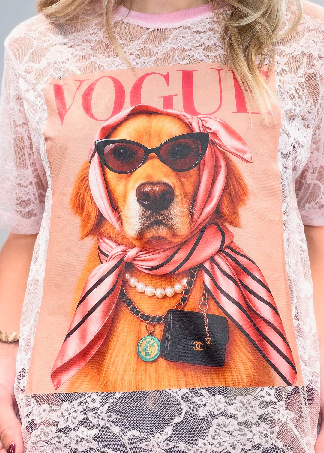 Close up of pink lace tee with golden retriever graphic on front