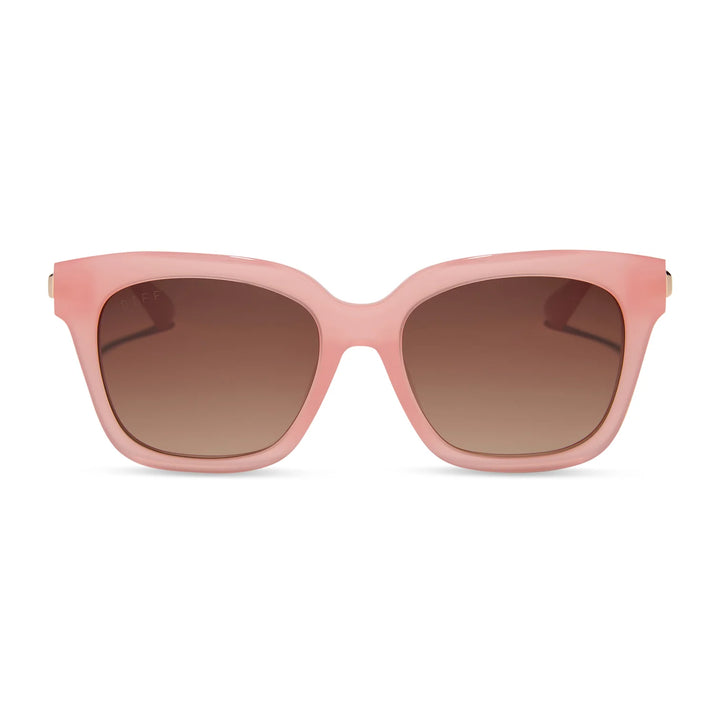 Pink cat-eye sunglasses with brown gradient lenses, shown from the front on a white background.