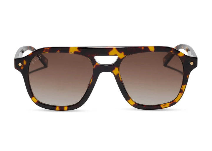 Pair of tortoise sunglasses with brown gradient lenses on white background