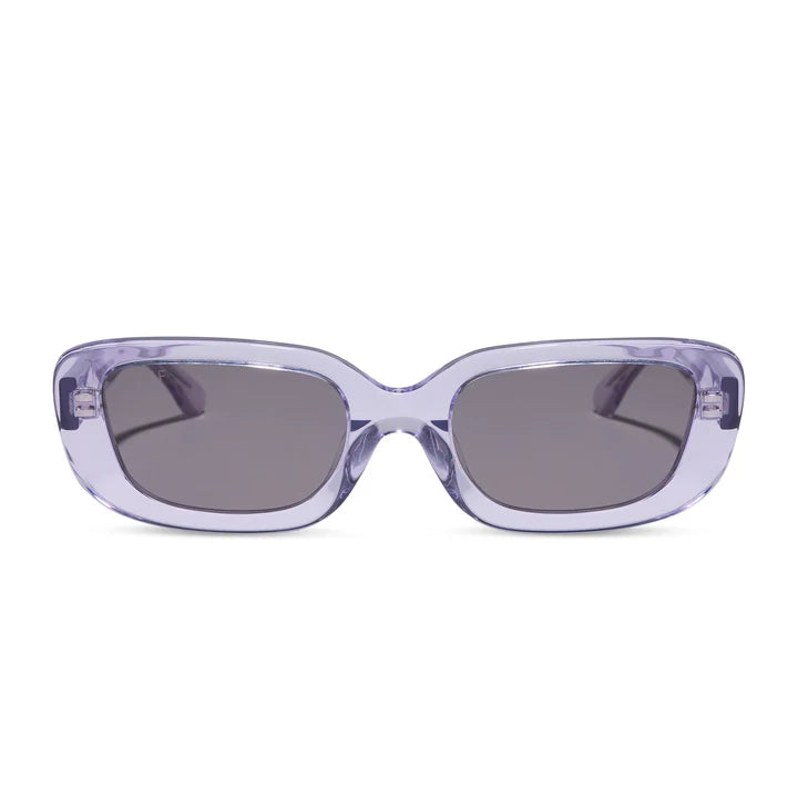 A pair of oversized square sunglasses with a translucent light purple acetate frame and dark gray lenses, shown against a plain white background.