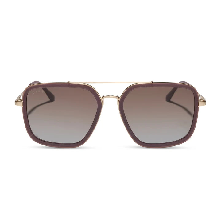 A pair of aviator-style sunglasses with a dark brown translucent acetate frame, gold metal rims, and gradient gray lenses, shown against a plain white background.