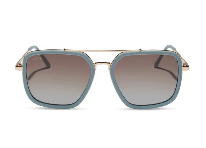 Blue sunglasses with gold frame on white background