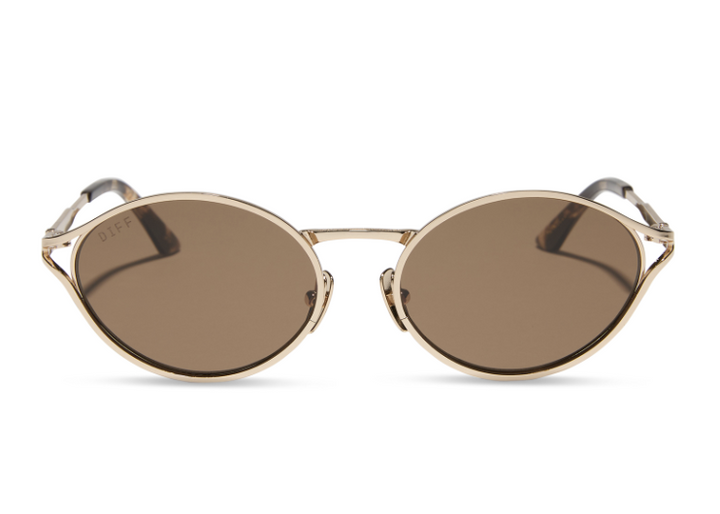 Pair of gold sunglasses with brown lenses on white background
