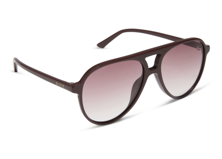 Pair of red sunglasses with burgundy lenses on white background
