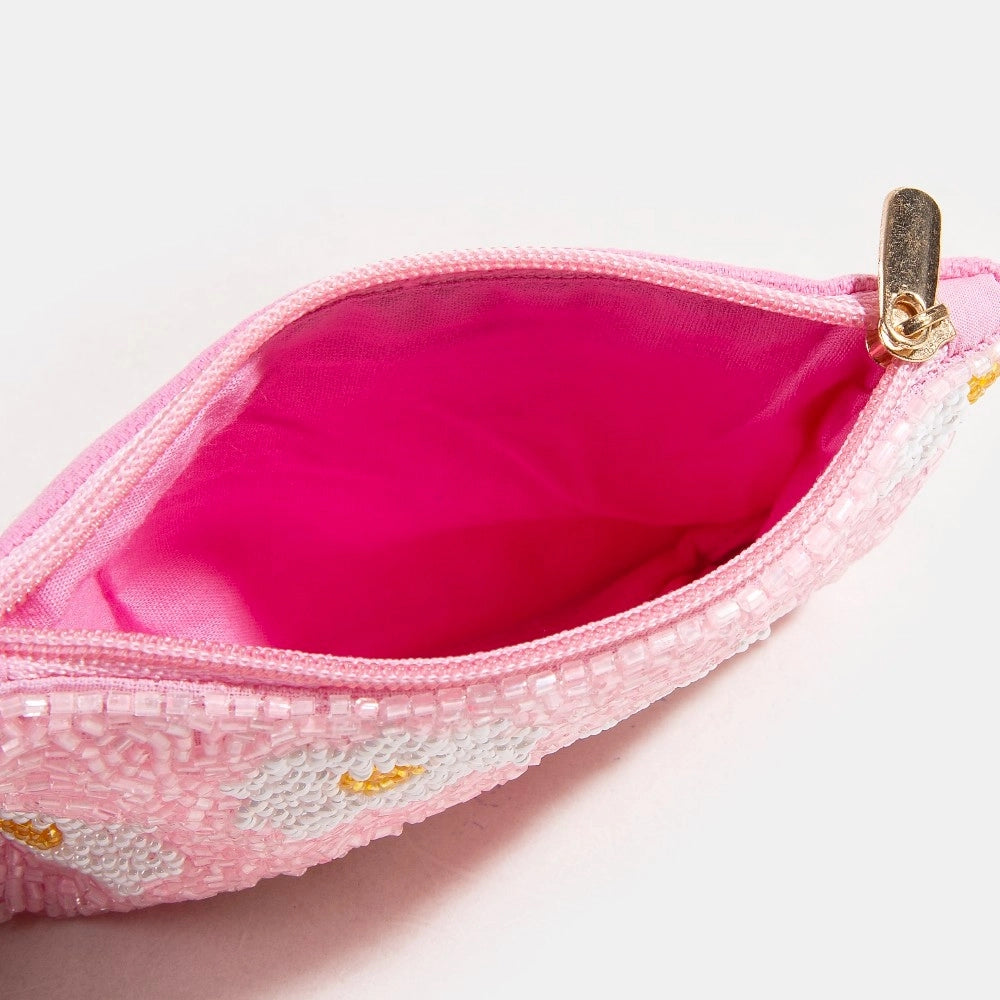 Pink pouch with gold zipper on a white background