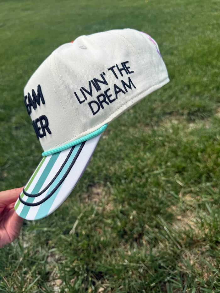 Hat embroidered with &