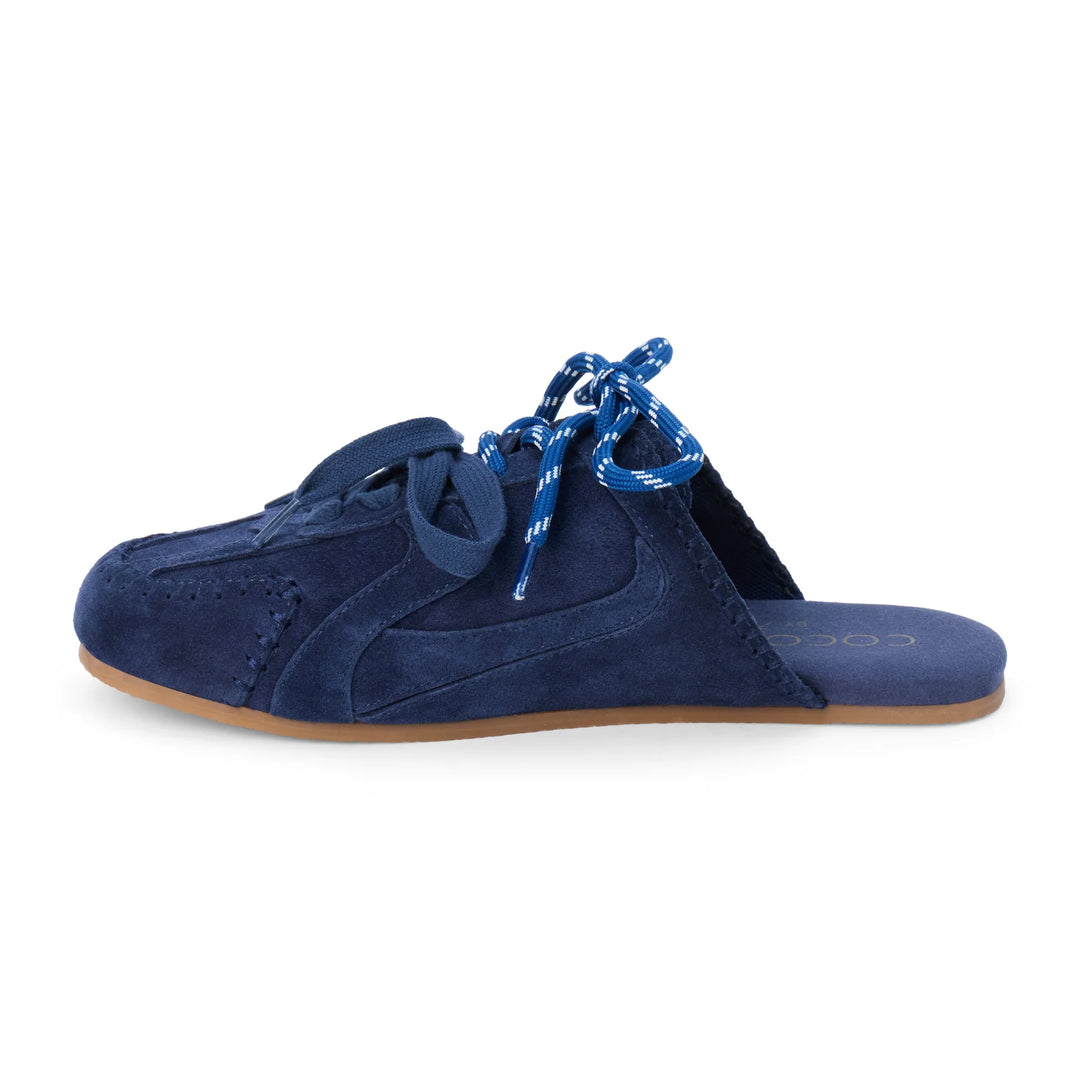 Blue suede shoe with white laces on a white background