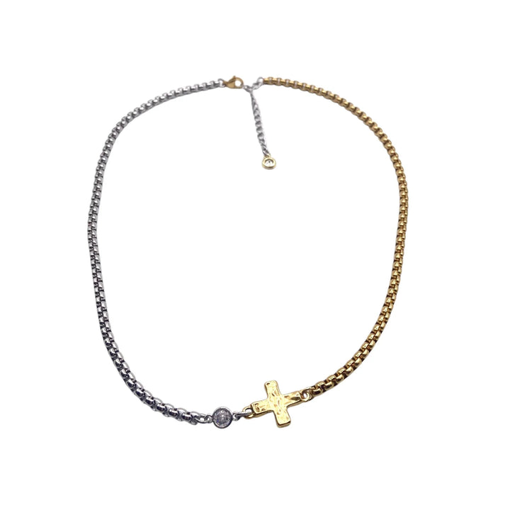 Necklace with a gold cross pendant on a white background