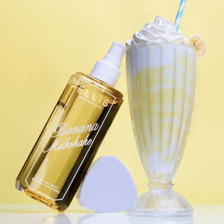 Ellis brooklyn perfume mist next to a milkshake on yellow background