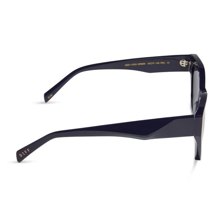 Black eyeglasses with gold accents on a white background